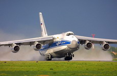 A Volga-Dnepr An-124-100 taking off from a wet airstrip. (Volga-Dnepr)