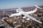 A C-141 Starlifter from the US Air Force's 438th Airlift Wing flying over Long Island, New York, in October 1993. It was used to transport senior civilian and military officials . (USAF)
