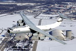 A C-141 flies over the US Air Force's National Museum at Wright-Patterson air force base on 13 December 2005. The aircraft will be put on display at the museum. (USAF/John Rossino)