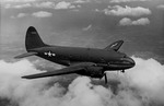 Curtiss XC-46B in flight. (USAF)
